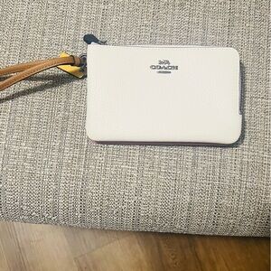 Coach pink/white wristlet